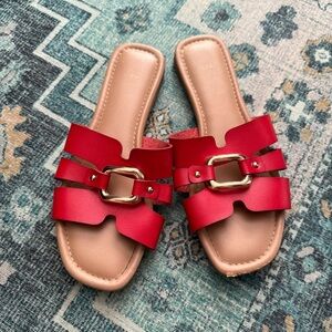 Red Flat Sandals with Gold Hardware